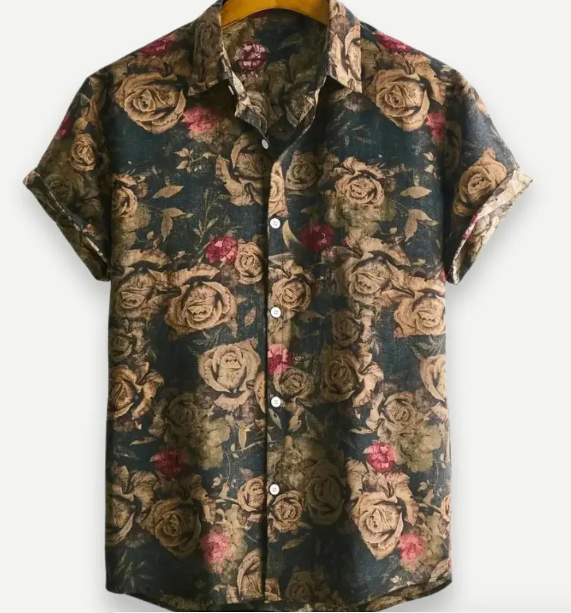 Man wearing a short sleeve Hawaiian shirt with a blue and white floral digital print and a lapel collar.