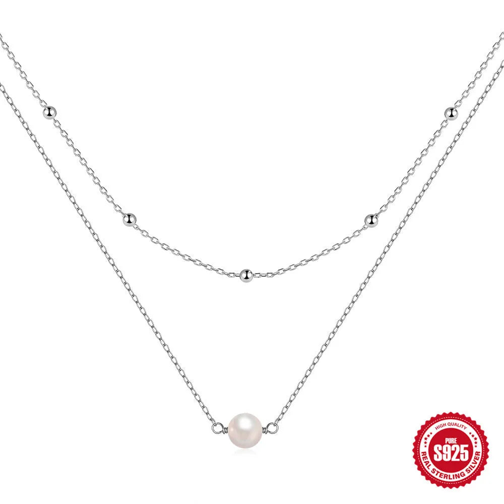 S925 sterling silver double layer women's necklace with geometric pearl pendant in gold or white gold.