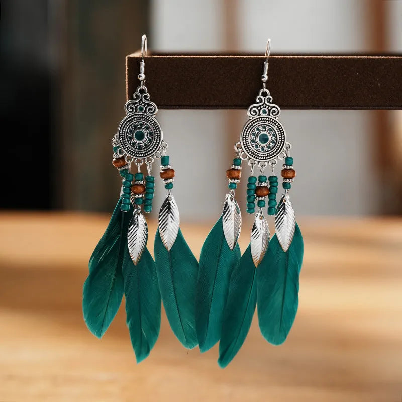 Round drop feather earrings with leaf pattern in alloy metal, available in multiple colours