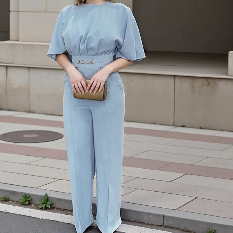 Blue men's two-piece polyester suit with long sleeves and trousers on a hanger