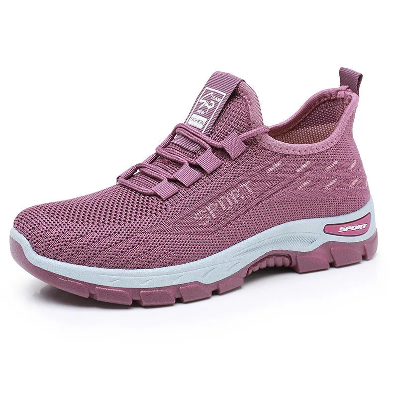 Men's and women's low-top casual sneakers with round toe and soft PVC sole in multiple colours.