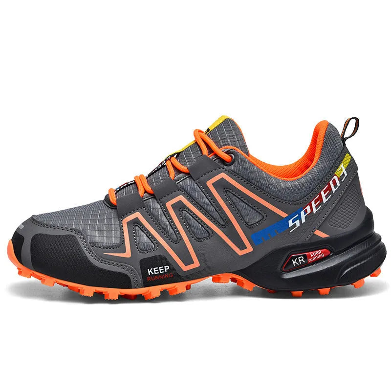 Men's low-top casual shoes in grey-orange, synthetic leather upper with mesh lining, on a rubber sole.