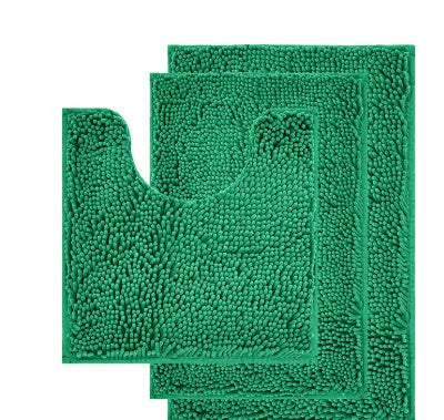 Dark green chenille three-piece U-shaped toilet mat set with non-slip TPR backing on bathroom floor.