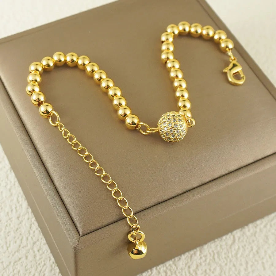 Arabic-style copper bracelet with a single zircon ball on a heart shape for women.