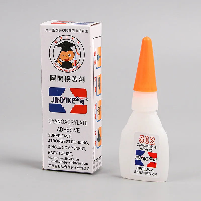 Shoe repair adhesive kit showing a glue tube and a 3x9 cm adhesive patch on a white background.