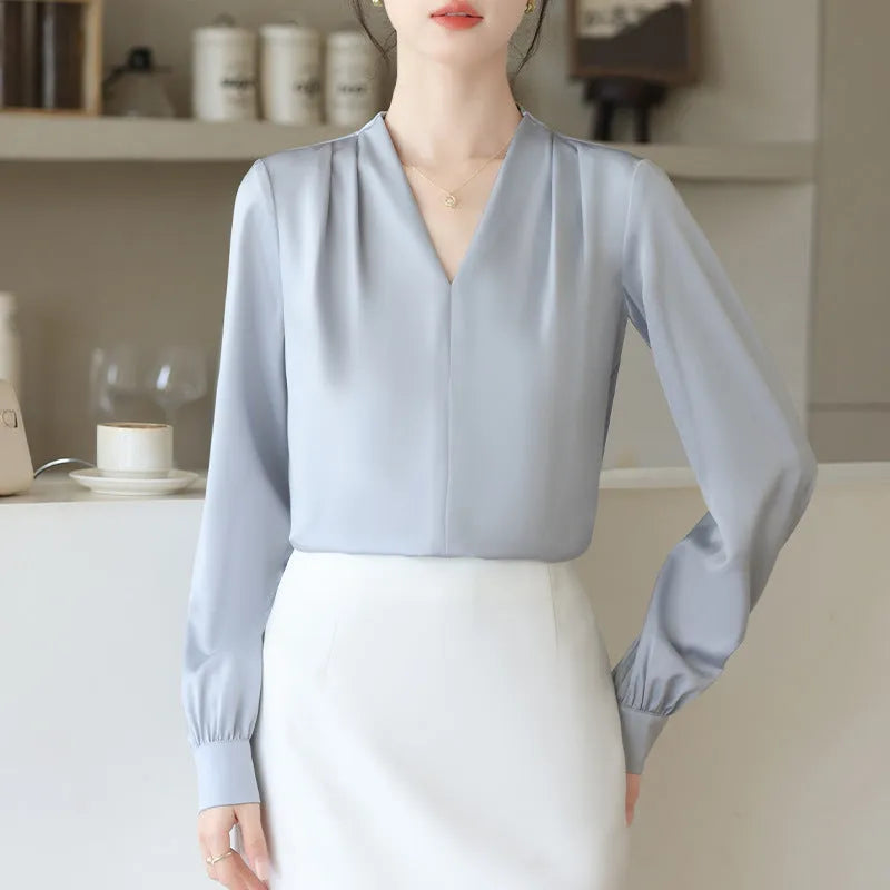 Women's blue satin long sleeve shirt with slim fit and 3D stitching detail on front