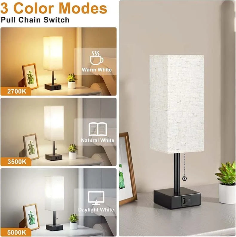 Small bedside table lamp with beige fabric shade and black base on a nightstand