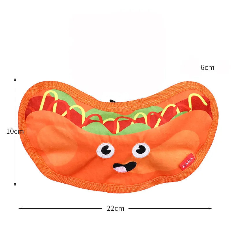Four colourful dog toys shaped like hamburger, fries, hot dog and pizza with crinkle and squeak features