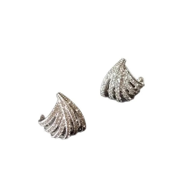 A pair of geometric-shaped earrings with a line design, made from zircon with an electroplated platinum finish.