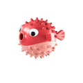 Yellow fish-shaped durable vinyl dog chew toy with textured surface and squeaker.