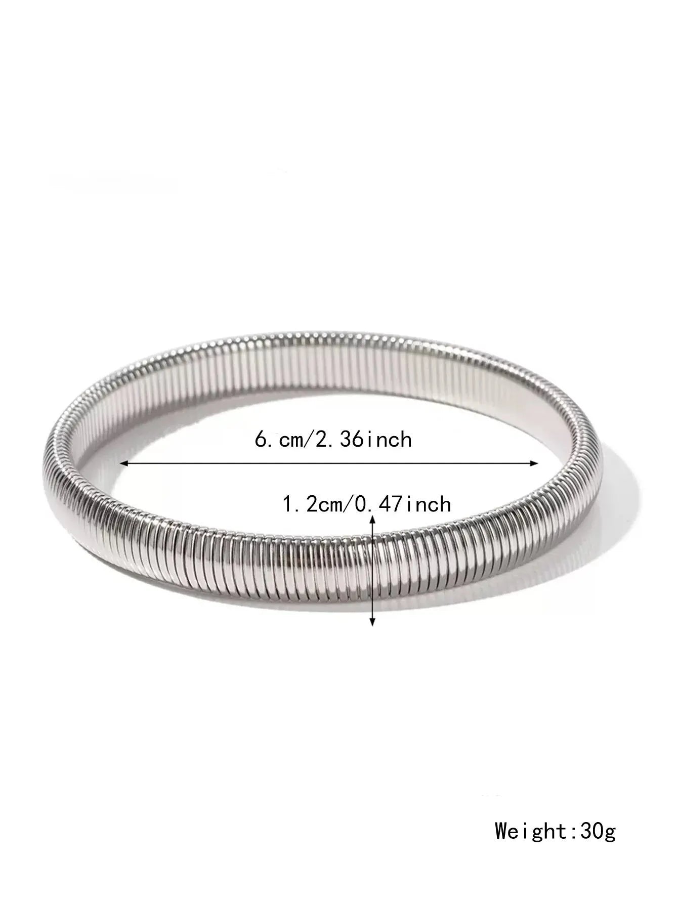 Women's titanium steel bracelet with vertical stripe ring design in gold plating, shown on a wrist.