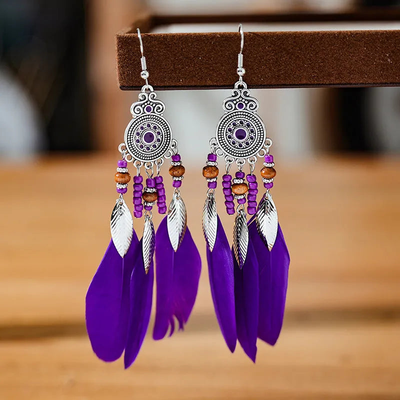 Round drop feather earrings with leaf pattern in alloy metal, available in multiple colours