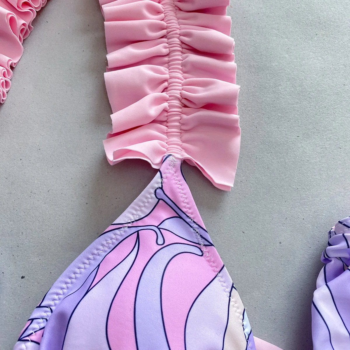 Women's pleated split bikini swimsuit with nylon fabric and spandex lining, sleeveless, in purple blue green or rose red, sizes S M L