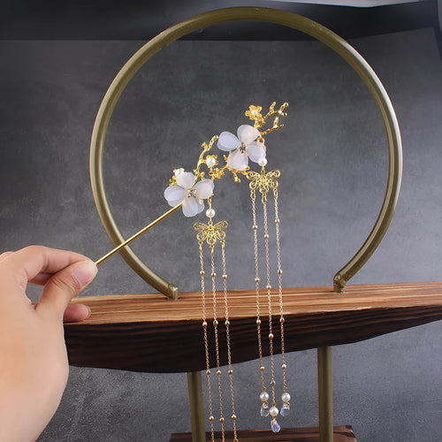 Ancient style hairpin with plum blossom branch, white flower, and tassel on metal stick, gold finish