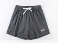 Men's double-layer mesh sports shorts in black polyester fabric showing side profile with elastic waistband