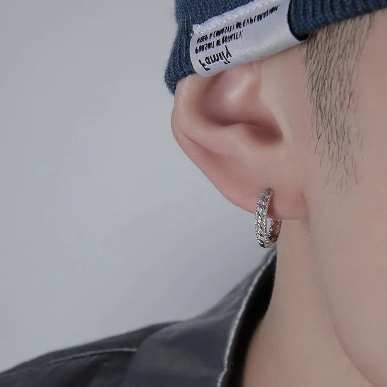 Men's geometric copper earring in silver, shown in single and pair configurations at 10mm and 14mm sizes.