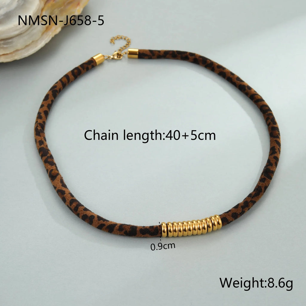 Geometric leopard pendant necklace with electroplated 18K gold finish on stainless steel chain