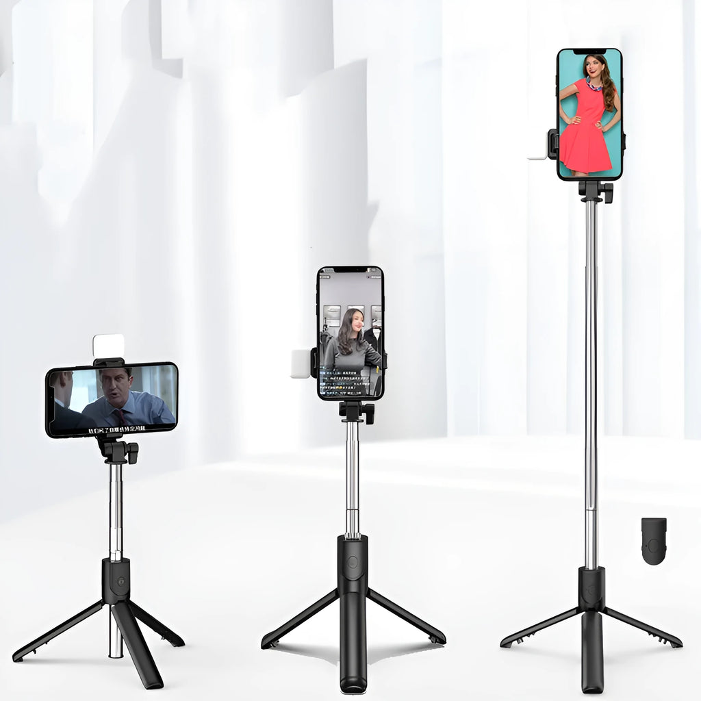 Black Bluetooth selfie stick extended from its integrated mini tripod base, holding a smartphone.