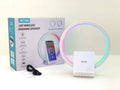 White smart Bluetooth speaker with wireless charging surface and LED ambience lighting