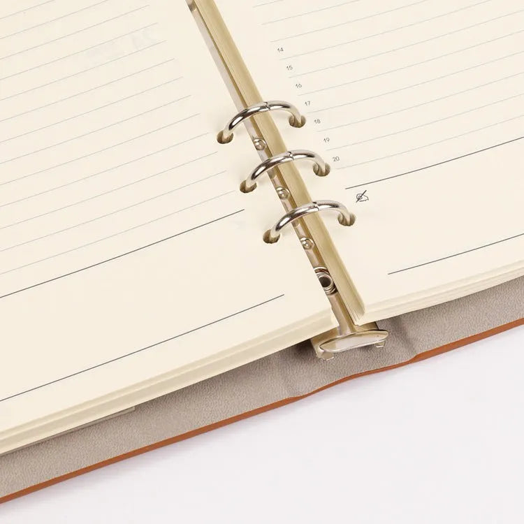 A5 loose-leaf notebook inner pages with monthly plan layout on white paper
