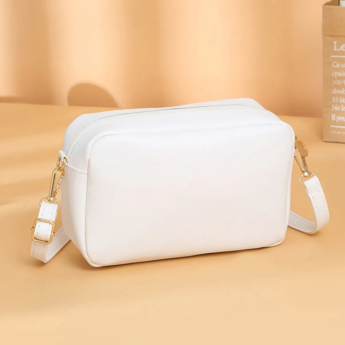 Women's solid colour PU leather shoulder bag with three-dimensional pocket in horizontal square shape