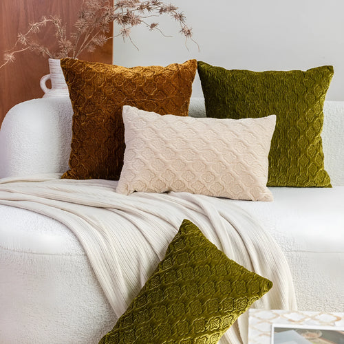 Brown gold antique-style quilted square cushion pillow and matching lumbar pillow on a sofa.