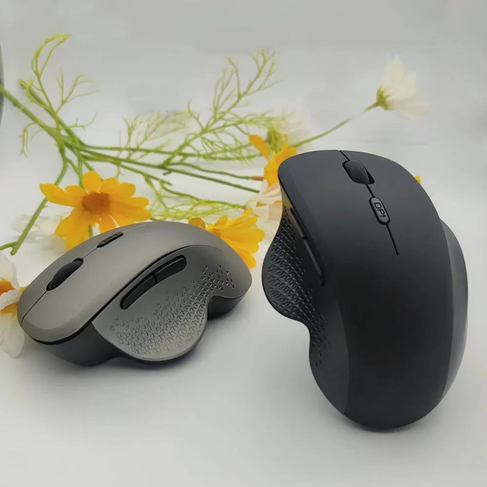 Wireless computer mouse with USB charging cable in black or grey colour