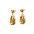 A pair of gold-coloured geometric earrings with a hemisphere base and dangling water drop pendant.