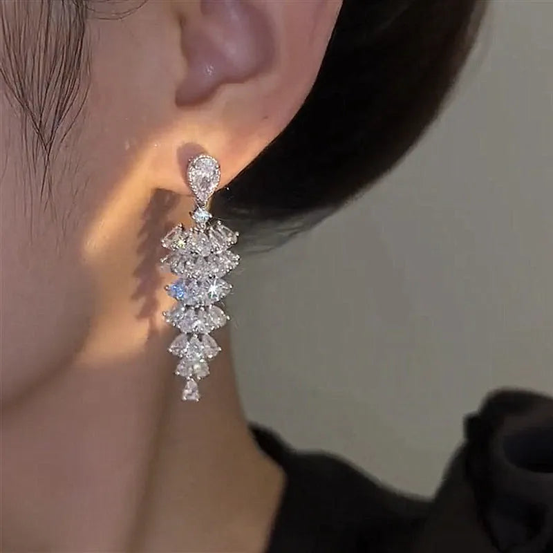 Women's silver pagoda colour Christmas tree drop earrings with pagoda shape on copper studs.