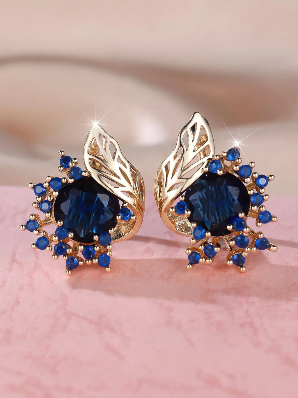 Round flower feather zircon drop earrings with champagne gold electroplate and coloured crystal settings.