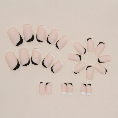 Black and white frosted artificial nails with French-style tips in plastic wearable set