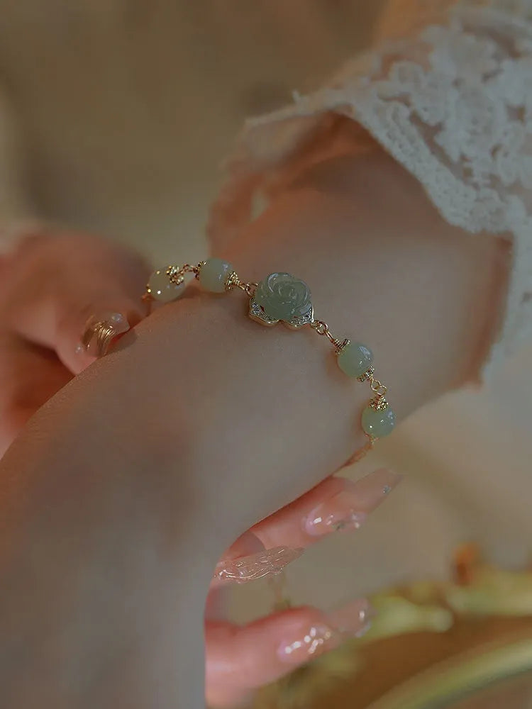 Original design women's bracelet in Hetian Jade Rose with 14K gold plating and a flower shape.