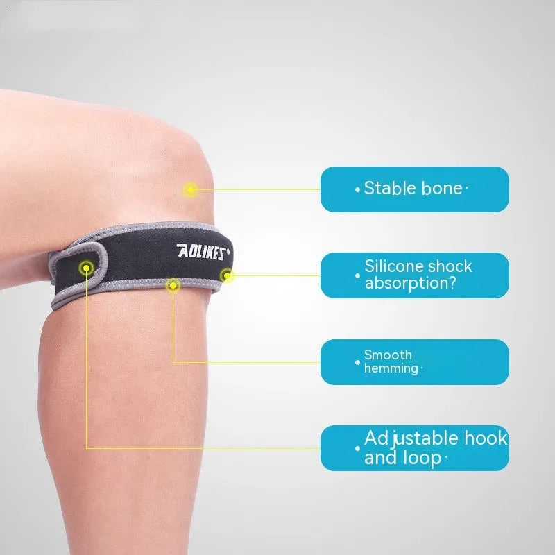Black and grey patella retinaculum knee support strap for adult sports use.