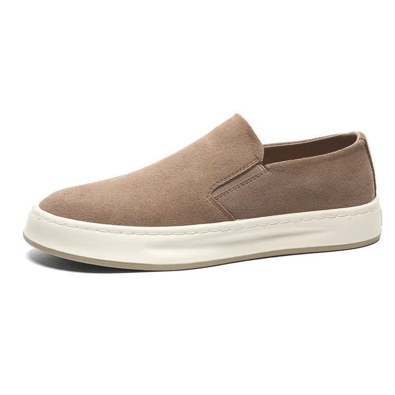 Men's casual slip-on shoes in apricot colour with round toe and mid heel, showing sewing line detail on artificial PU upper