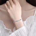 Blue diamond heart necklace and bracelet set with geometric pendant on adjustable chain