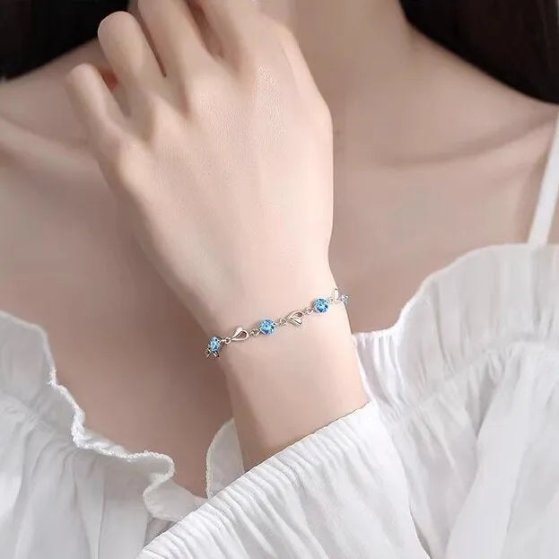 Blue diamond heart necklace and bracelet set with geometric pendant on adjustable chain