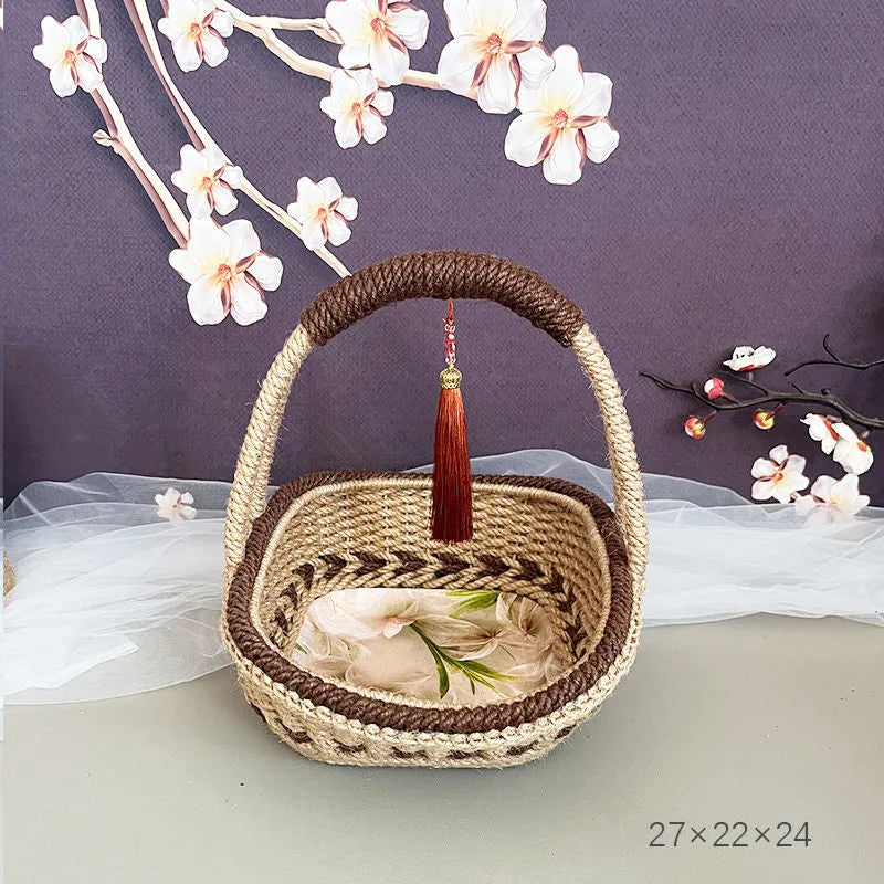 Coffee brown hand-woven hemp rope basket measuring 19 by 12 centimetres.