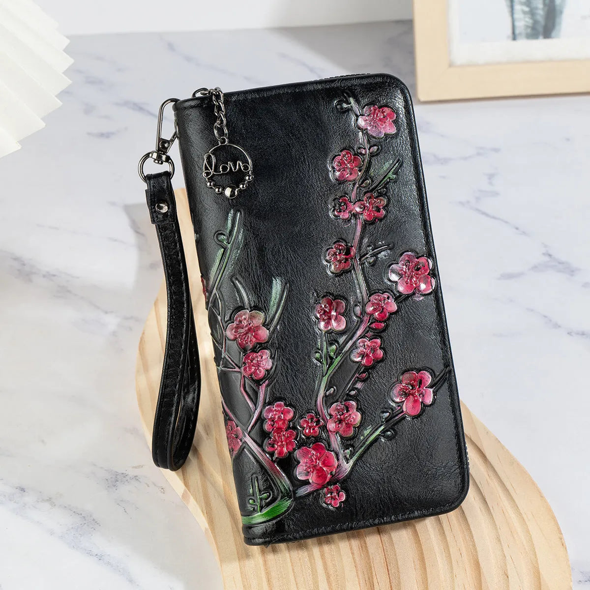 Chinese style handbag with embossed floral pattern in retro design with zipper closure