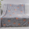 Cartoon print flannel child blanket showing one of five available designs