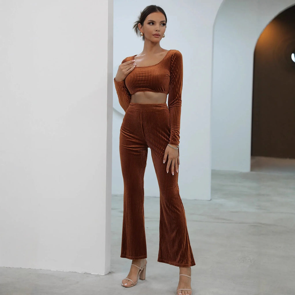Caramel coloured long sleeve sweater and trousers casual set on a hanger
