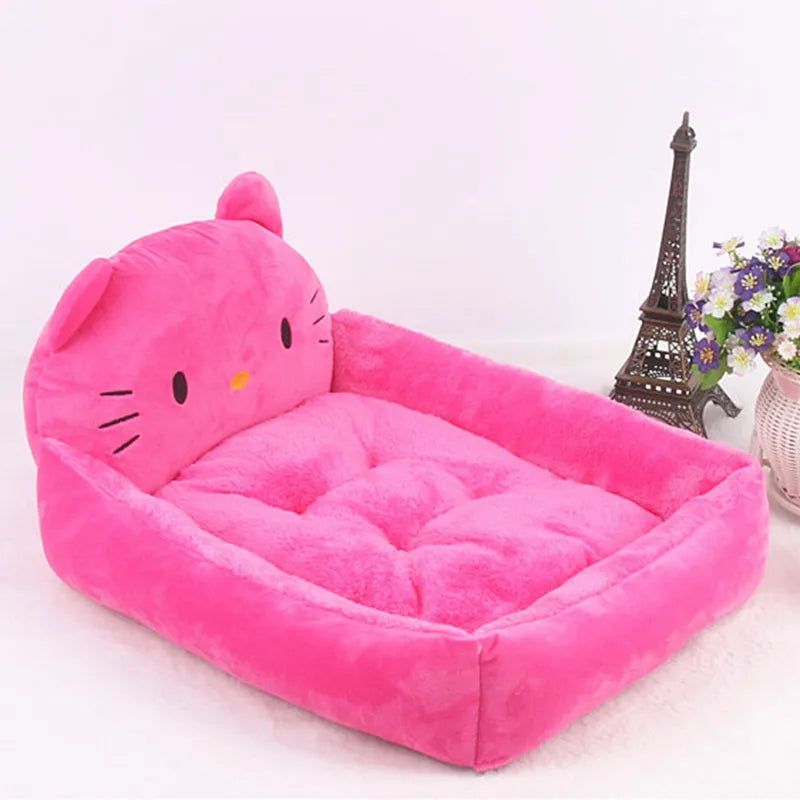 Cartoon-style plush pet sofa bed with a raised rim for a small dog or cat, shown in a blue colour