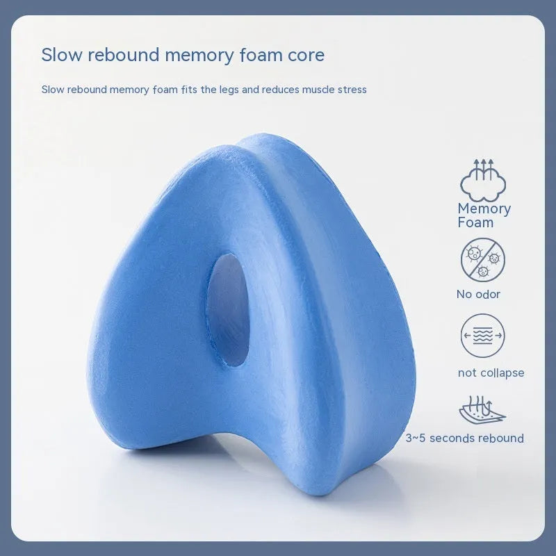 Heart-shaped memory foam leg pillow in blue colour, dimensions 25x23x13cm