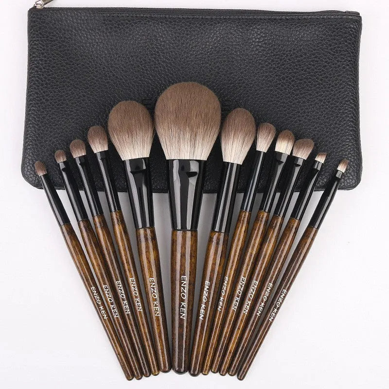 12-piece makeup brush set with wooden handles in portable storage bag