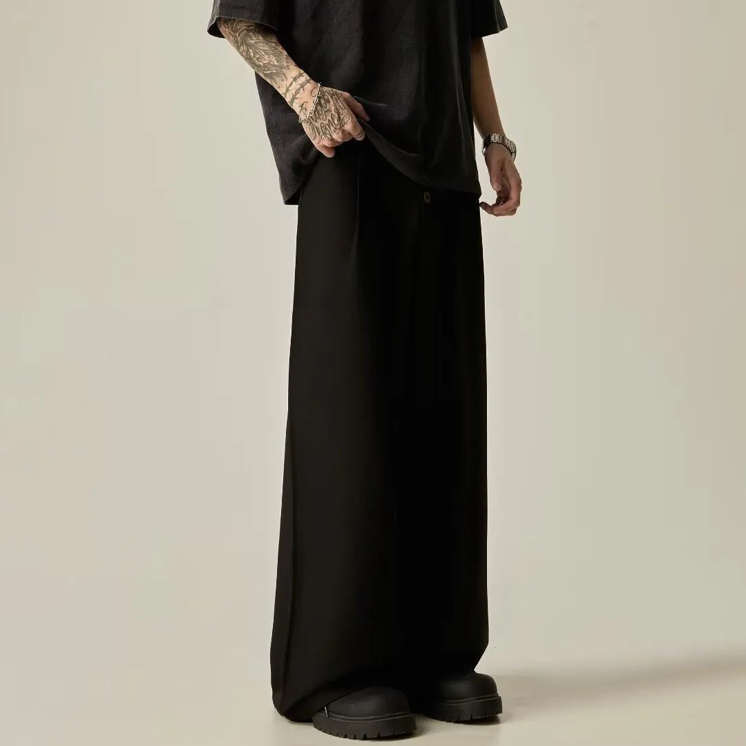 Men's solid black wide-leg casual trousers with a straight-leg cut and elasticised waist.
