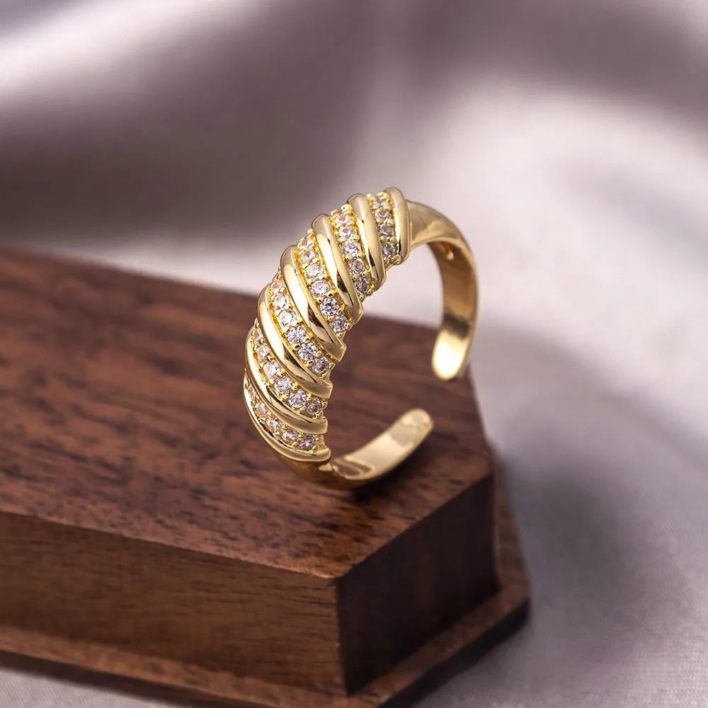 Copper open mouth ring with zircon ornament, adjustable U-shaped design, electroplated J-060 gold finish on grey background