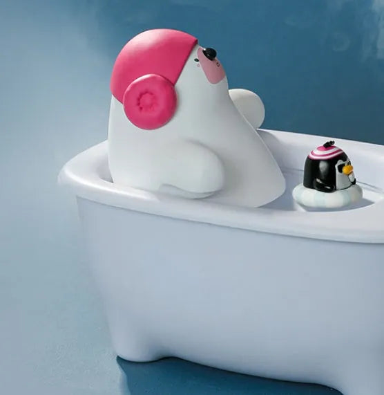 White Creative USB desktop air humidifier and scent diffuser on a wooden table.