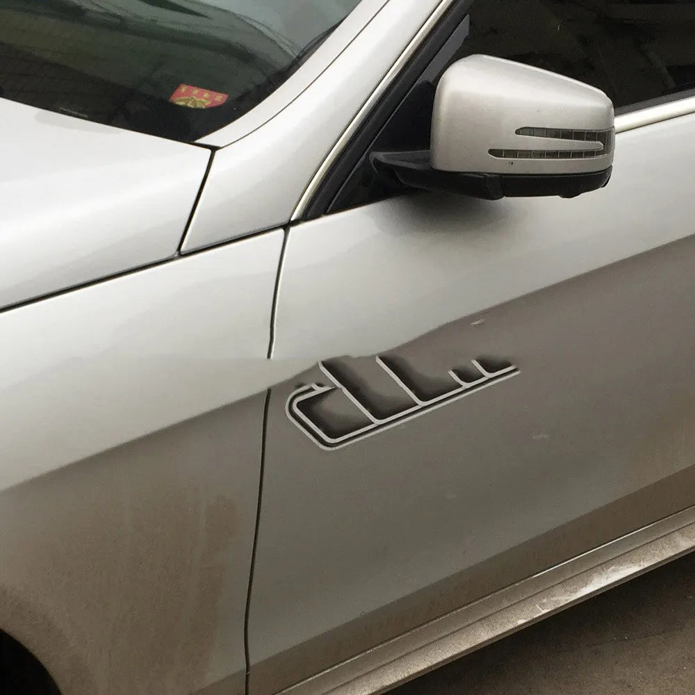 Grey imitation car air outlet vent sticker 40x10cm on a vehicle body panel with strong adhesive PET material