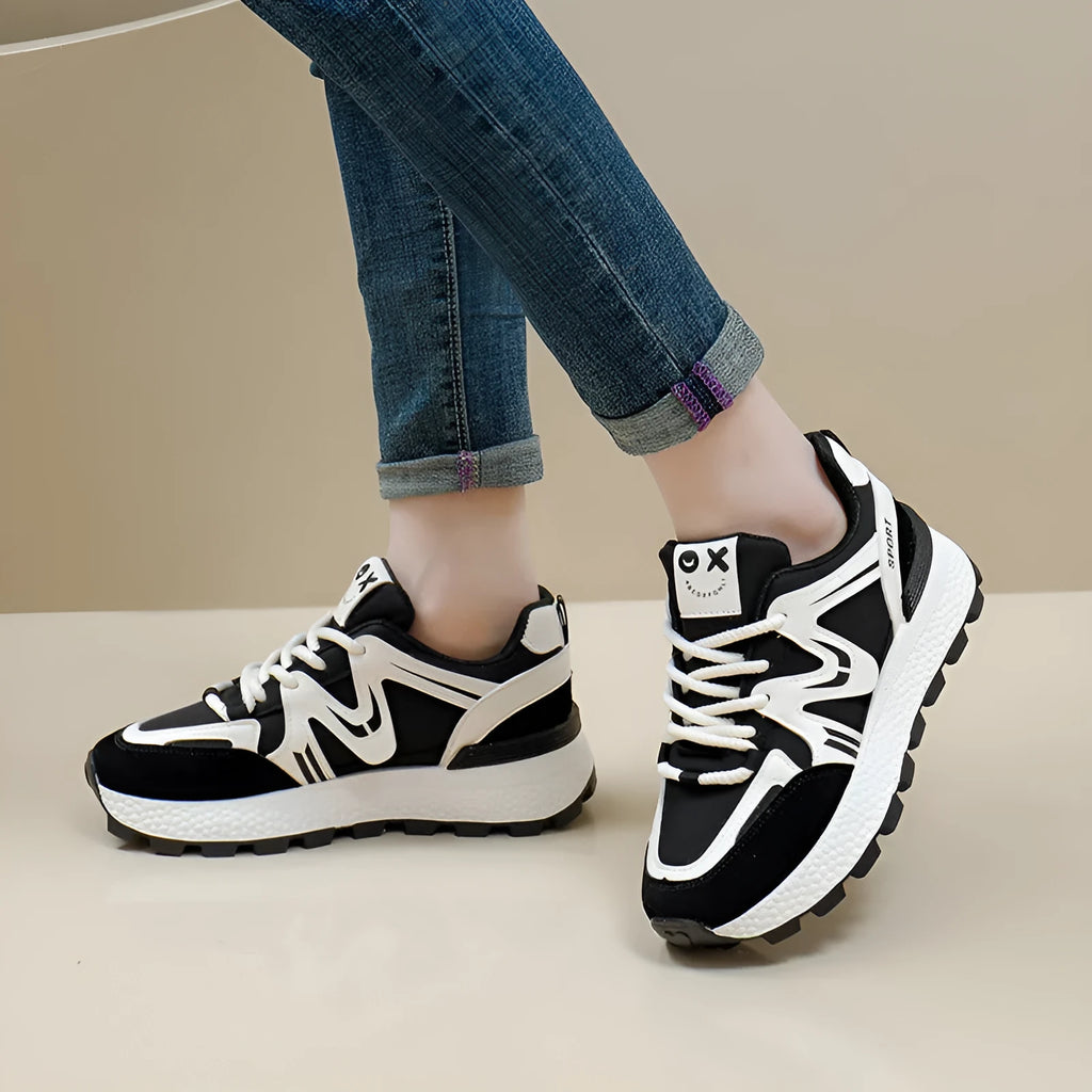 Women's black flat platform casual shoes with round toe and front lace-up, made from artificial PU with cotton lining.