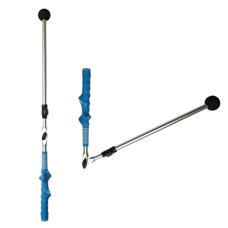 Golf folding swing trainer with black aluminium shaft and rubber grip on grass