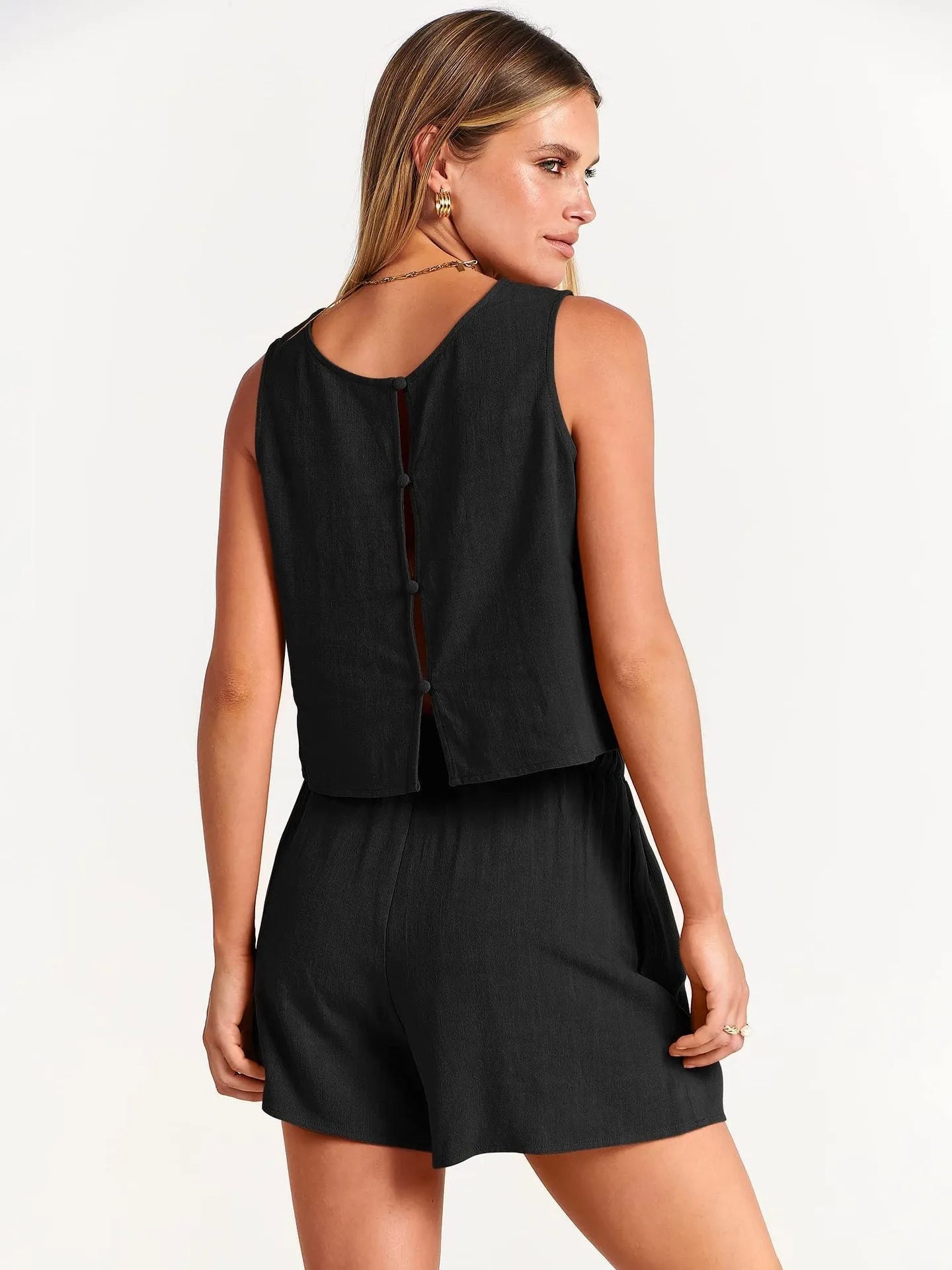 Women's apricot coloured sleeveless top and drawstring shorts summer outfit set on a hanger